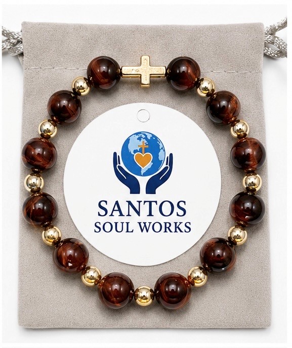 Autumn Grace bracelet — tiger's eye and gold beads with a cross charm on a Santos Soul Works pouch